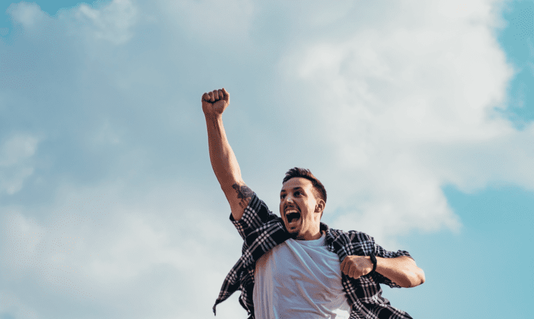 man jumping for joy