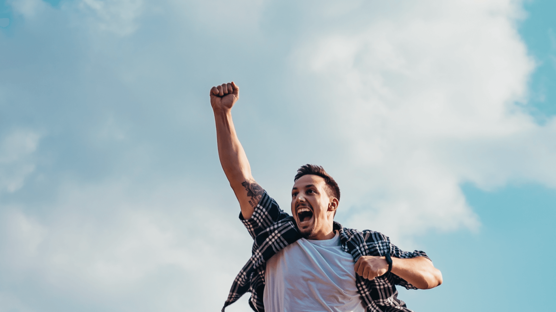 man jumping for joy